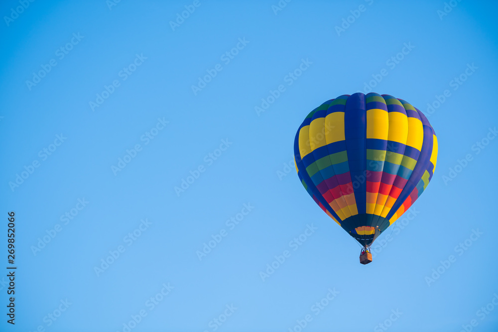 Naklejka premium Colorful of balloon on blue sky with copy space