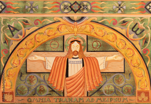 BELAGGIO, ITALY - MAY 10, 2015: The paint on the main altar on the wood - Jesus on the corss in church Chiesa di San Giacomo from 20. cent.
