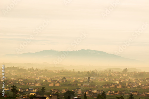 Misty peaks and villages in the morning, in southwestern China. © photobee