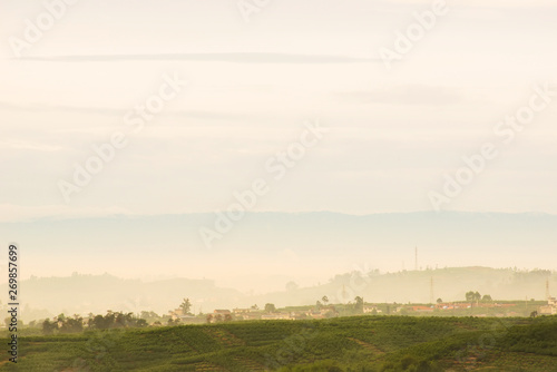 Misty peaks and villages in the morning, in southwestern China.