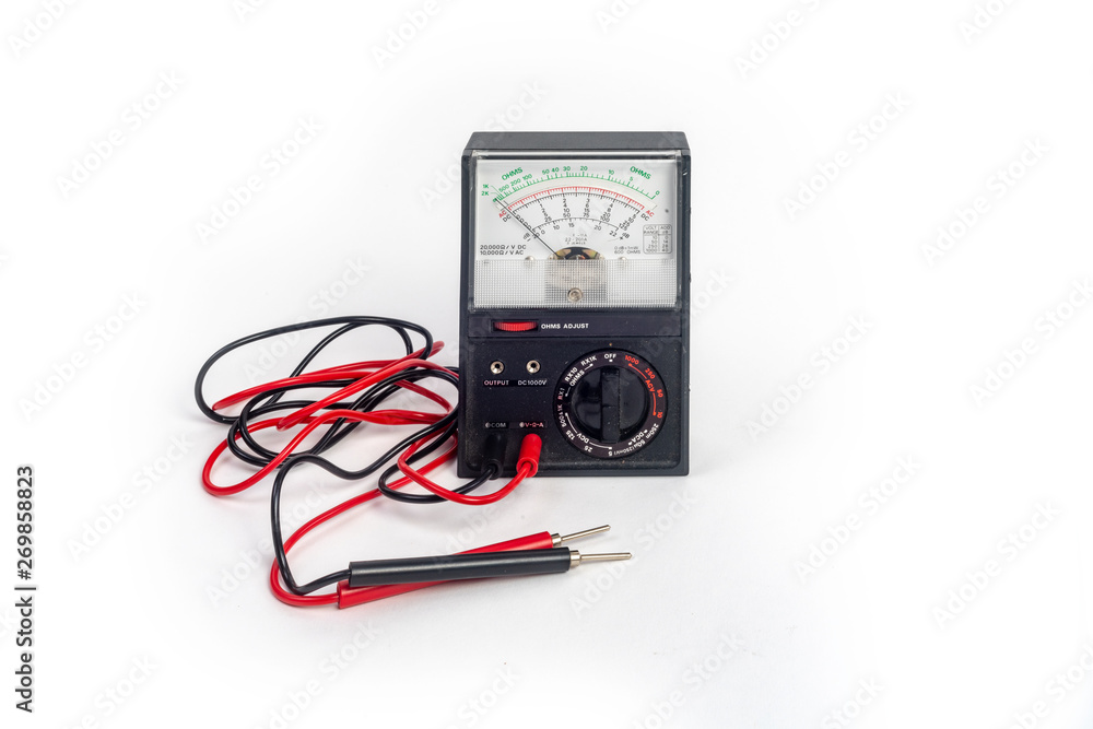 Analog multimeter, that combines several measurement functions in one unit. Vintage model Analog multimeter, that combines several measurement functions in one unit. Vintage model
