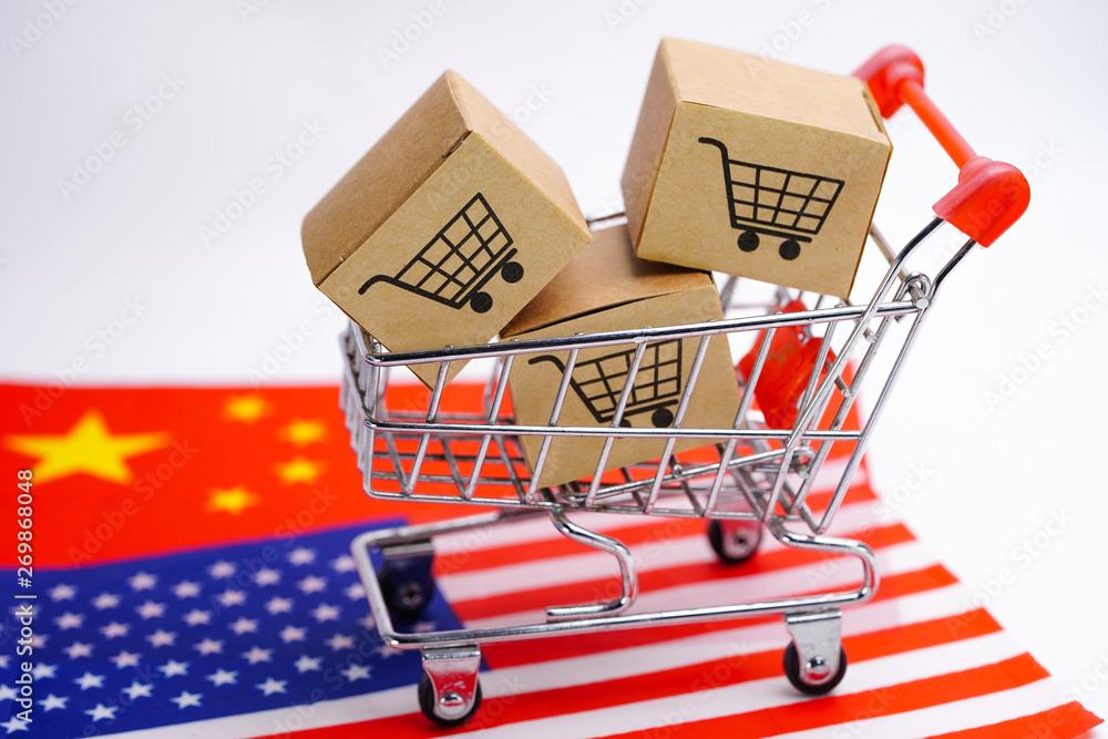 Box with shopping cart logo and The USA America and China flag : Import Export Shopping online or eCommerce delivery service store product shipping, trade, supplier concept.