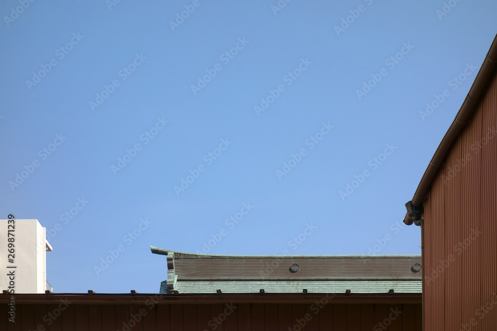 Temple roof and urban landscape Temple roof and urban landscape