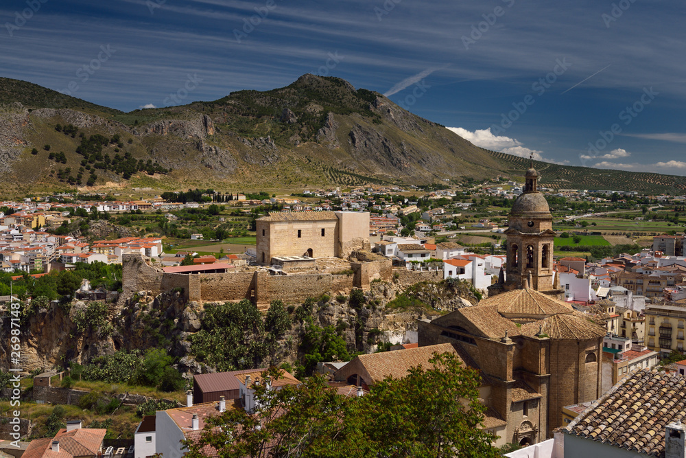 Church of the Incarnation with Moorish Alcazaba and Gorda Peak at Loja Granada Spain