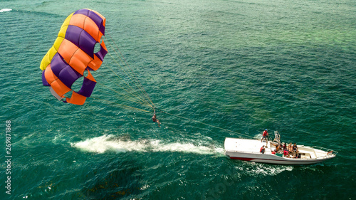 parachute riding with boat sea view Bali Indonesia