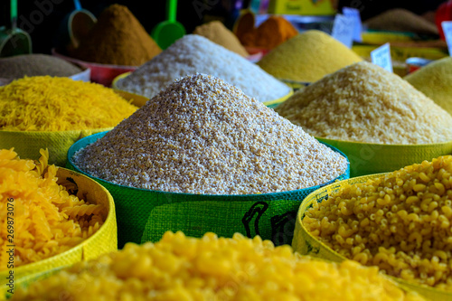 A large bag of pasta and couscous in a traditional Moroccan market.