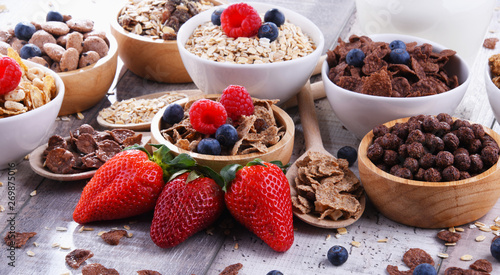 Bowls with different sorts of breakfast cereal products