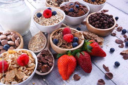 Bowls with different sorts of breakfast cereal products