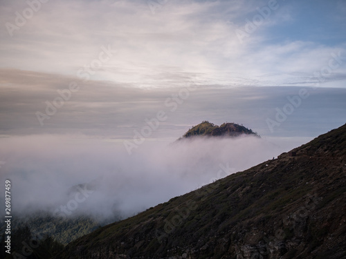 Mountain top seen through clouds (ID: 269877459)