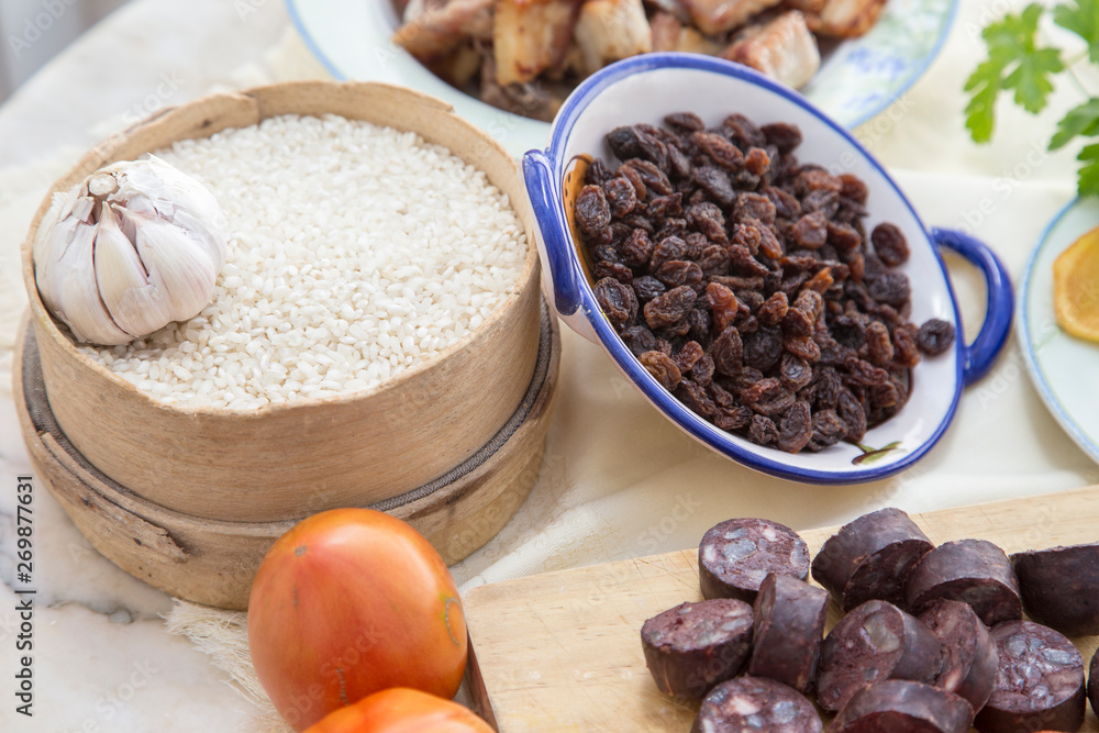 Fototapeta premium Natural and homemade cooking ingredients to make the recipe of baked rice with ribs