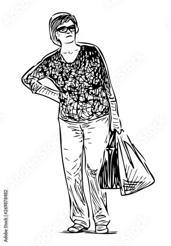 Sketch of a casual townswoman standing with bags on the street photo