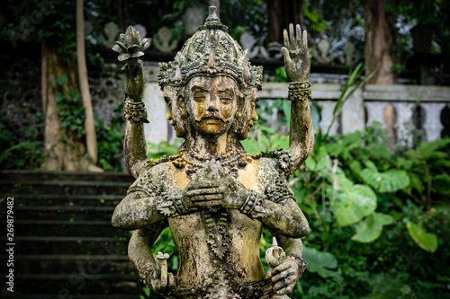 Traditional Balinese Hindu God statue in the garden setup