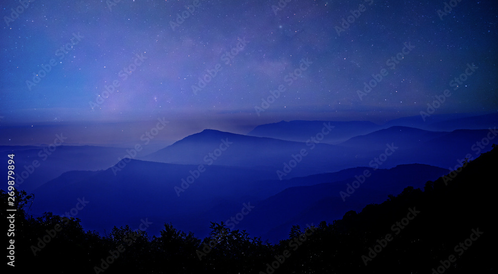 Landscape with Milky way galaxy at  the mountains