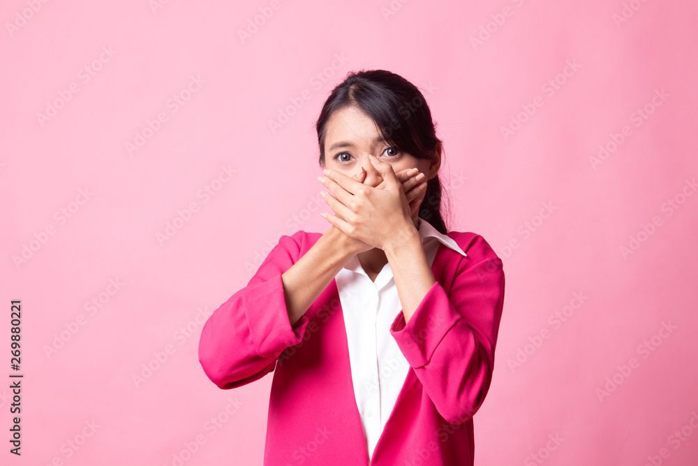 Beautiful young Asian woman close her mouth. Beautiful young Asian woman close her mouth.