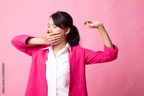 Принти на полотні Sleepy young Asian woman yawn.