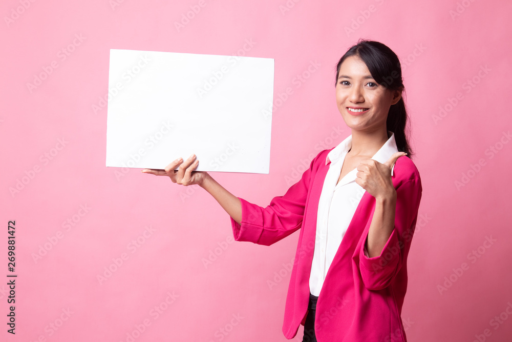 Young Asian woman show thumbs up with white blank sign. Young Asian woman show thumbs up with white blank sign.