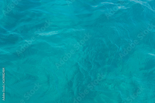 smooth surface from above of swimming pool blue water simple background with empty space for copy or text