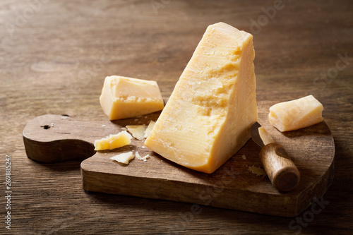 parmesan cheese on a wooden board
