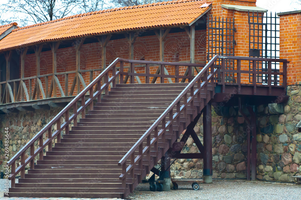 wooden staircase to the red brick tower wooden staircase to the red brick tower