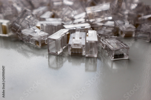 a bunch of rj45 network cable connectors isolated on white background