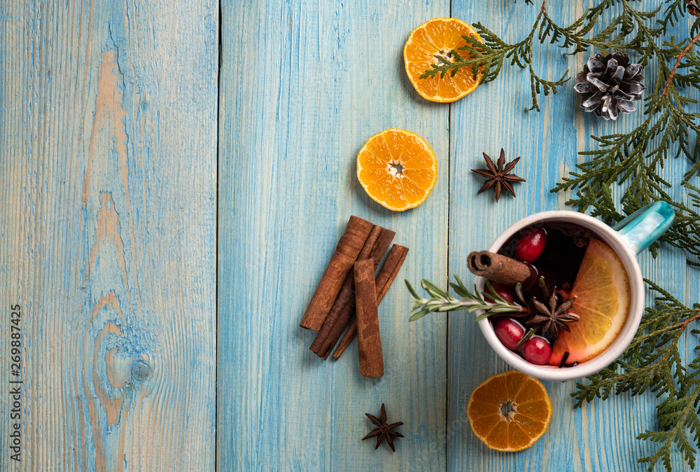 red wine christmas blue background orange cinnamon top view.. red wine christmas blue background orange cinnamon top view..