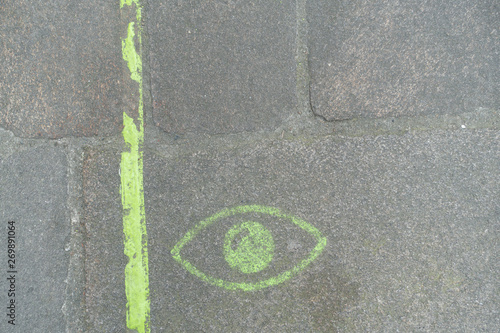 A Green Line is painted on the streets of Nantes to guide tourists to attractions in the french city when walking around sightseeing.The green eye marks a place of interest.tony skerl photo