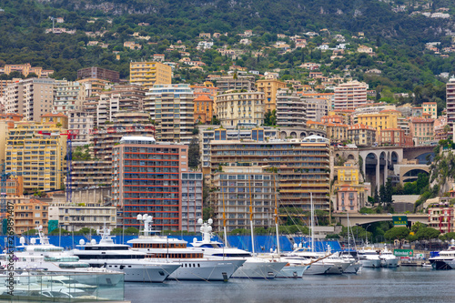 Apartments and luxury yachts in the harbor of Monte Carlo, Monaco, Europe.