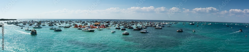 Panoramic View of the  Crab Island Park in a Sunny Day with Several Small Boats in the Sea