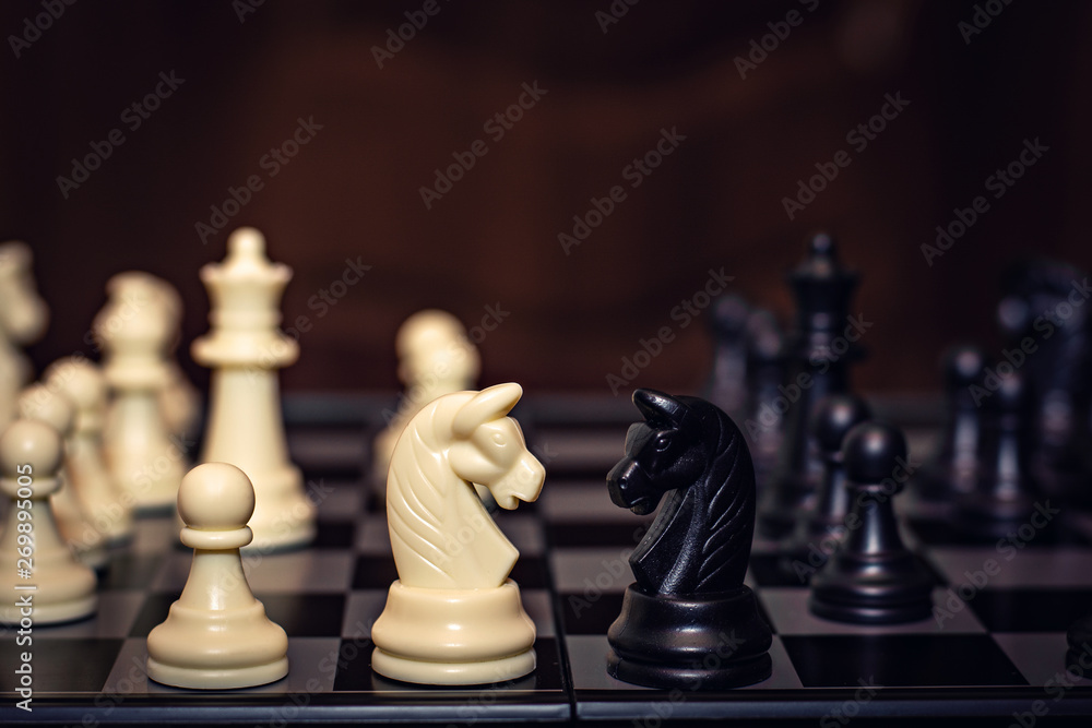 Chess knights head to head. Chess knights head to head.