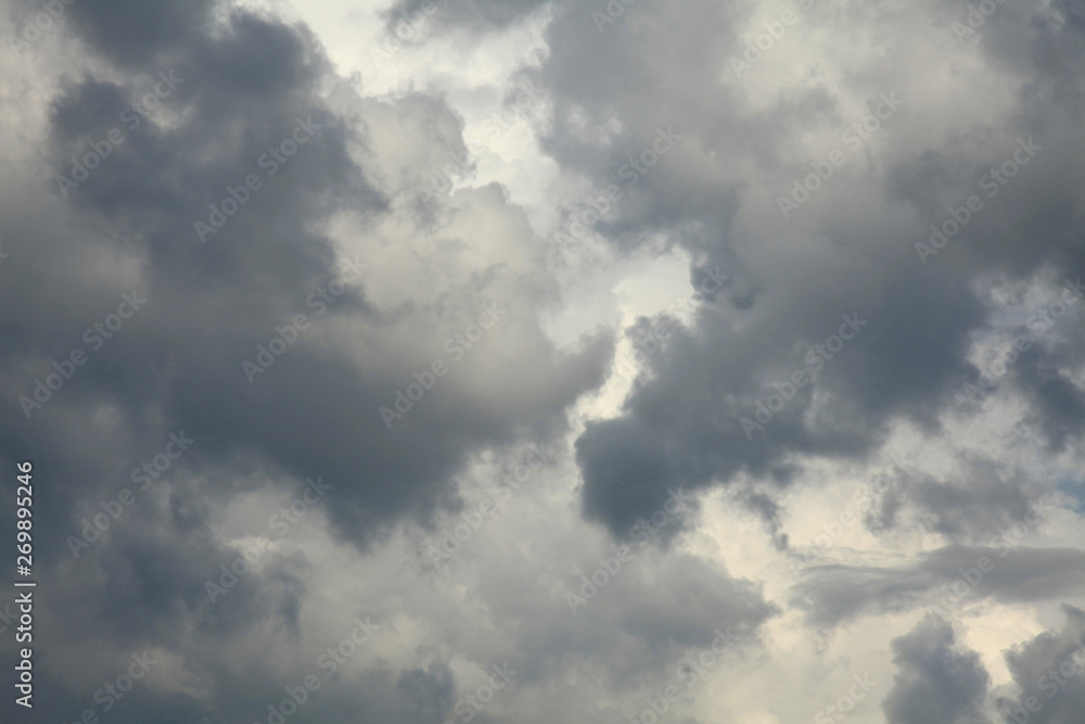 The background of thunderclouds. Stormy, gray, lead sky before the rain and rainstorm