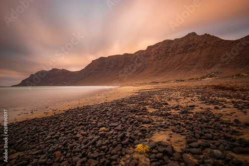 sea landscape which was created on the famous Famara beach in Lanzarote, long shutter speed