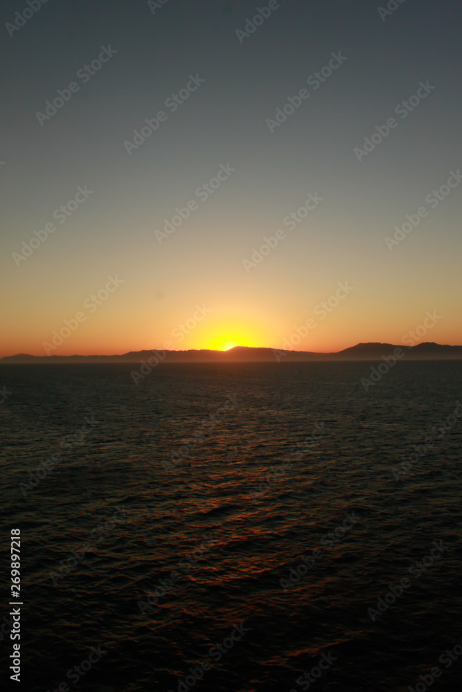 Naklejka premium Mountain Islands in sunset