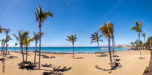 Sandy beach in Puerto del Carmen on Lanzarote photo