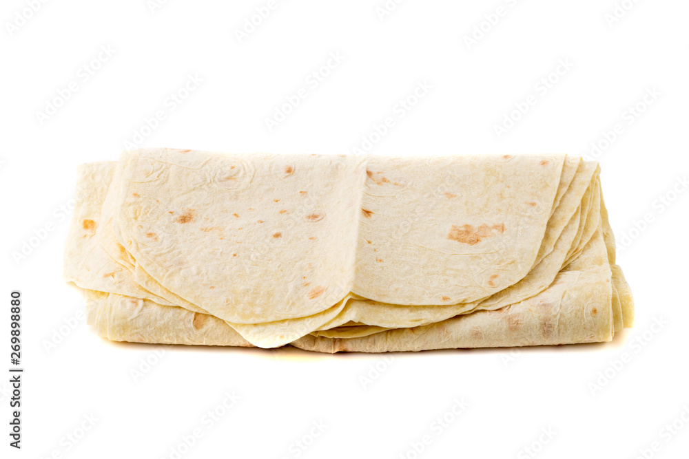 Thin pita bread on a white background. Armenian pita bread close-up.