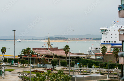 seafront of the city of Santander, palace of festivals of Cantabria. Ferry and sailboats