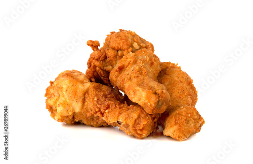 Fried legs on a white background. Chicken legs deep fried close-up.