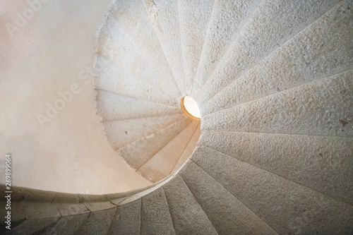 Padula, Salerno, Campania, Italy - April 21, 2019: Detail of the helical stone staircase leading to the library of the Certosa di San Lorenzo photo