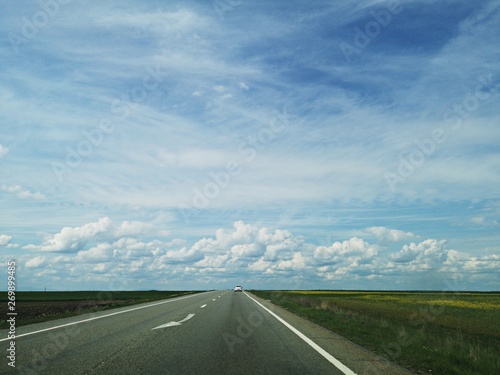 Empty road and blue sky © dianacoman