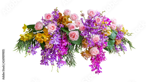Obraz na płótnie Pink rose and tropical orchid flowers with green leaves floral arrangement nature wedding backdrop isolated on white background, clipping path included