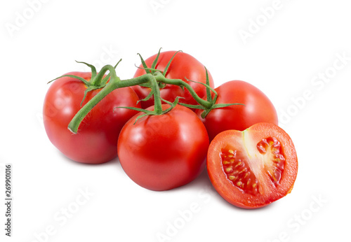 The branch of tomatoes is isolated on a white background