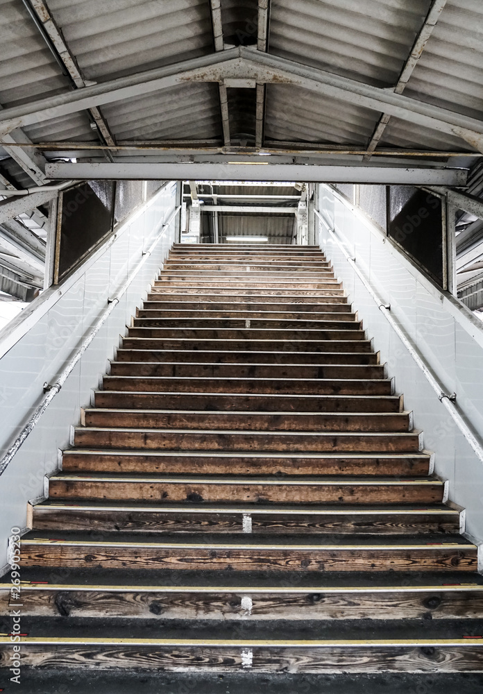 wooden exterior stairs at train station