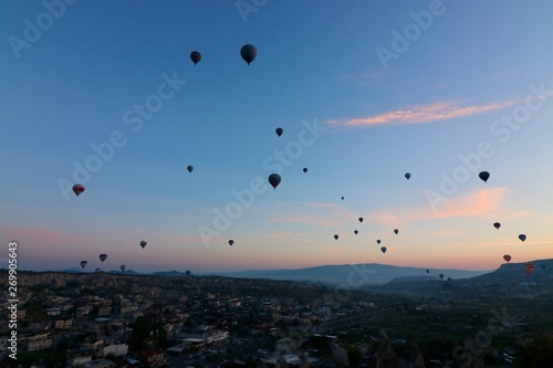 Hot air balloons over Goreme, Turkey, before sunrise.