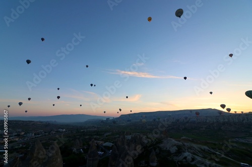 Hot air balloons over Goreme  Turkey  before sunrise.