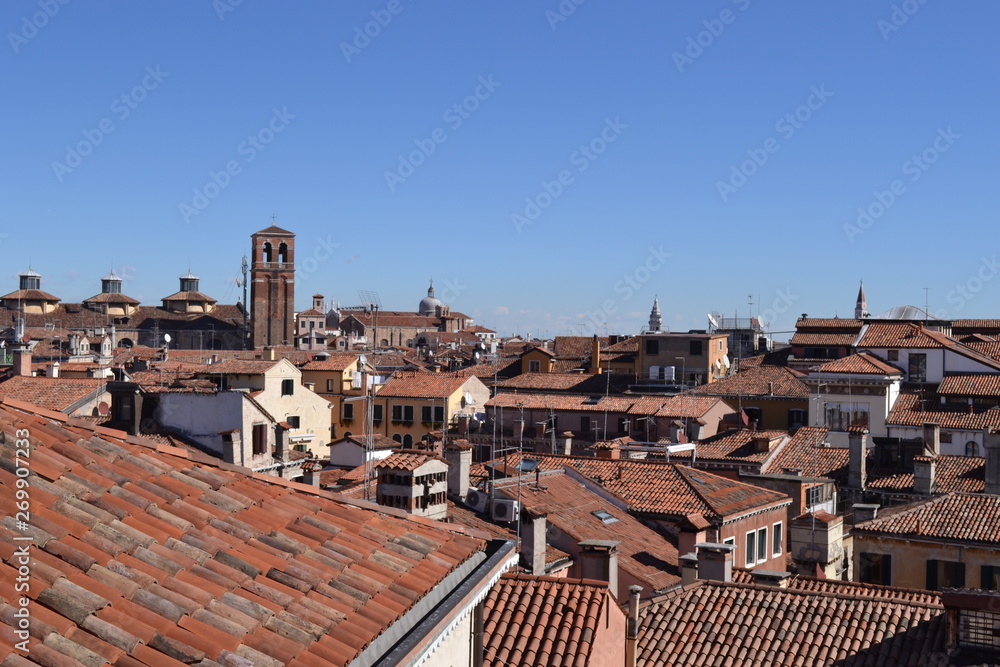 View over the roofs of the ancient city in Italy on a sunny day.