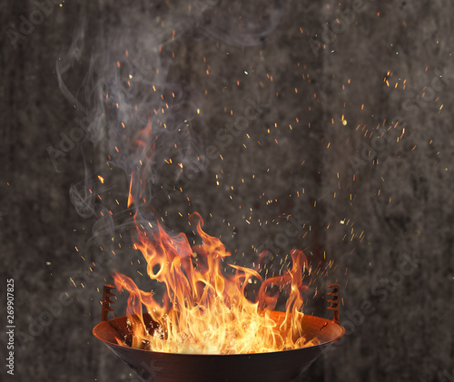 Kettle grill with fire flam...