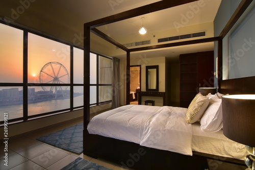 Photography Elegant Bedroom of a High Rise Apartment in Dubai Overlooking Marina