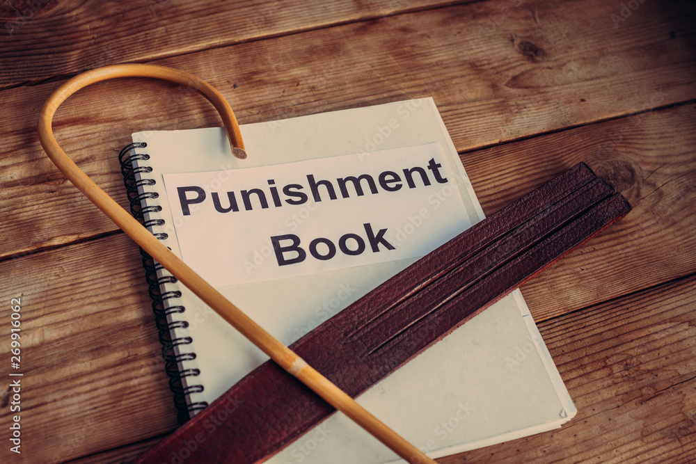 corporal punishment book. vintage school rules concept. dragon rattan cane  and leather tawse for ass spanking. sexual role play. bdsm toys Stock Photo  | Adobe Stock