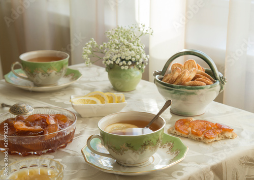 Wallpaper Mural Delicious fresh breakfast for two. Tea with lemon, apple jam and biscuits Torontodigital.ca