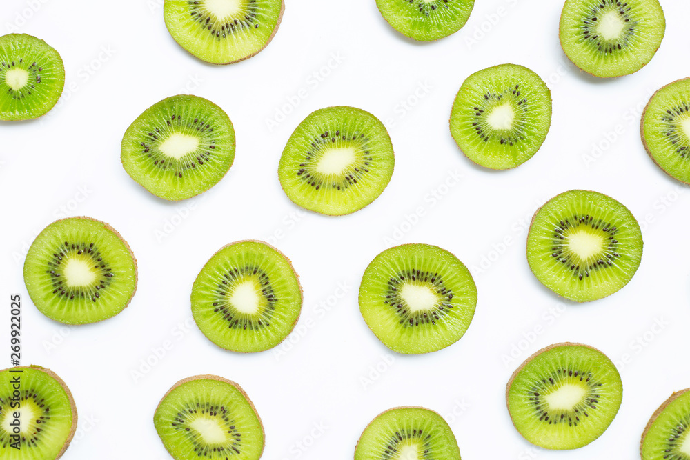 Ripe kiwi fruit slices isolated on white Ripe kiwi fruit slices isolated on white
