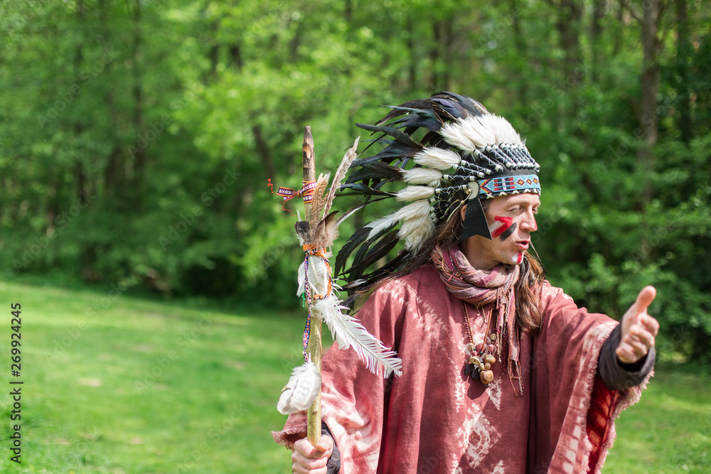 Native american indian, tribal leader in traditional indian clothes. Indian culture and history concept